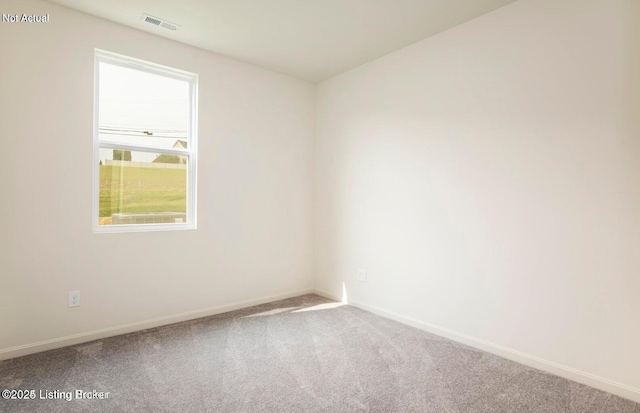 1853 Washington Blvd, Lyndon, KY 40242 - empty room featuring carpet flooring and baseboards