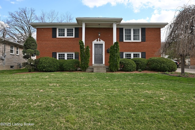 7514 Pimlico Dr, Louisville, KY 40214 - raised ranch featuring brick siding and a front yard