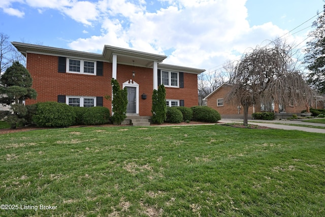 7514 Pimlico Dr, Louisville, KY 40214 - view of front facade featuring brick siding and a front yard