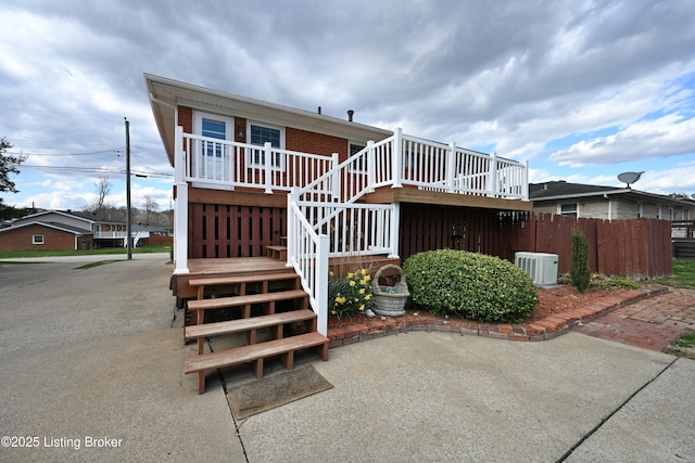 7514 Pimlico Dr, Louisville, KY 40214 - back of house featuring central AC, stairs, and a deck