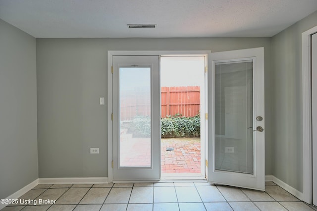 7514 Pimlico Dr, Louisville, KY 40214 - entryway featuring light tile patterned flooring and baseboards