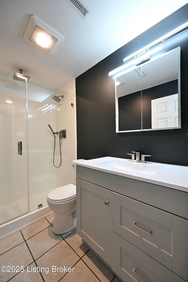 7514 Pimlico Dr, Louisville, KY 40214 - full bath with a shower stall, tile patterned floors, vanity, and toilet