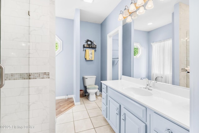 966 Lawrence St, Brandenburg, KY 40108 - full bathroom featuring plenty of natural light, vanity, toilet, and tile patterned flooring