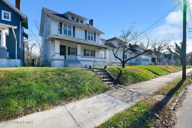 621 S 41st St, Louisville, KY 40211 - american foursquare style home with a porch, a residential view, and stairs