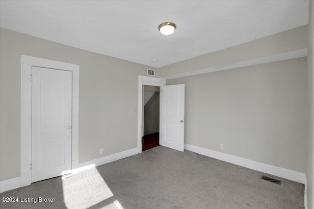 621 S 41st St, Louisville, KY 40211 - unfurnished bedroom featuring carpet flooring and baseboards