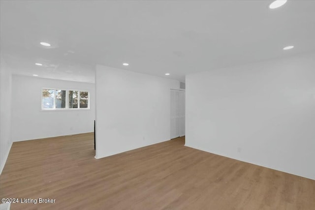 4104 Hispanyola Ct, Louisville, KY 40229 - spare room with wood finished floors and recessed lighting