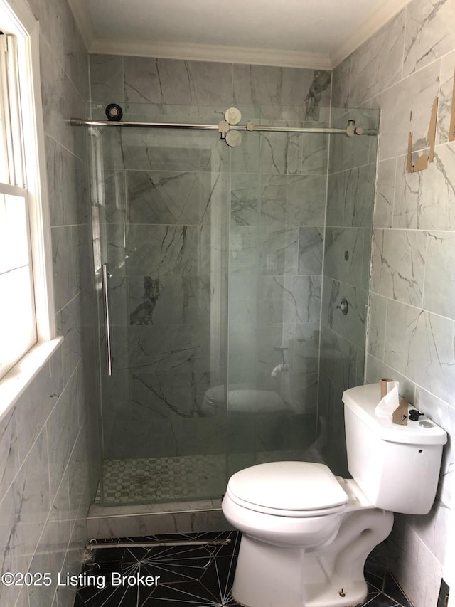 5902 Pageant Way, Louisville, KY 40214 - full bath featuring ornamental molding, tile walls, a shower stall, and toilet