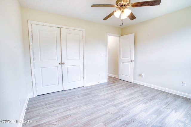 305 Valhalla Trce, Vine Grove, KY 40175 - unfurnished bedroom with light wood-style flooring, a closet, baseboards, and ceiling fan