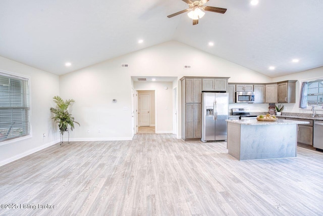 305 Valhalla Trce, Vine Grove, KY 40175 - kitchen featuring stainless steel appliances, a center island, a ceiling fan, recessed lighting, and light wood-style floors
