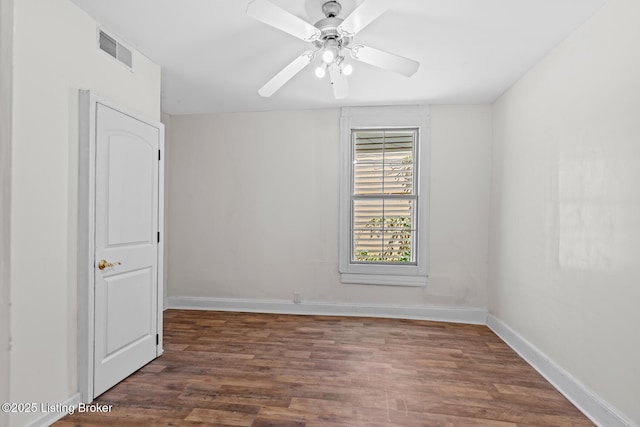 823 S Jackson St, Louisville, KY 40203 - unfurnished room with wood finished floors, baseboards, and ceiling fan
