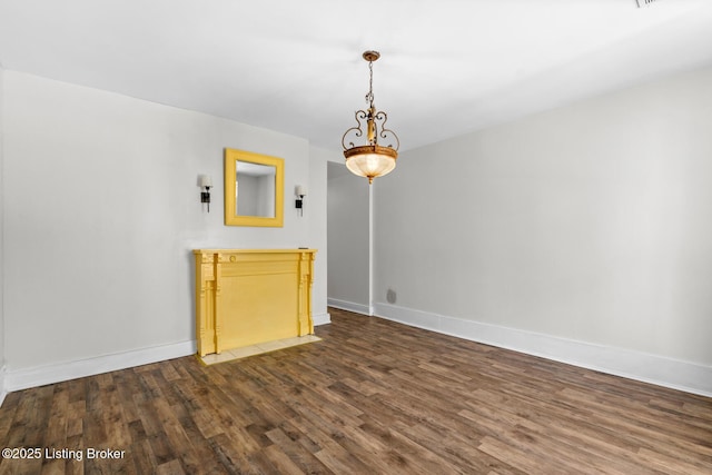 823 S Jackson St, Louisville, KY 40203 - unfurnished room featuring dark wood-style floors and baseboards
