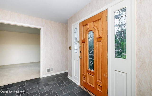 7212 Peppermill Ct, Louisville, KY 40228 - entryway featuring baseboards, dark carpet, and wallpapered walls