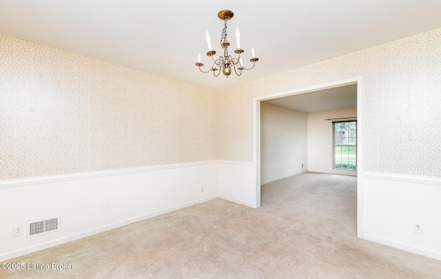 7212 Peppermill Ct, Louisville, KY 40228 - carpeted empty room featuring wallpapered walls, a chandelier, and baseboards