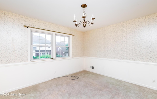 7212 Peppermill Ct, Louisville, KY 40228 - spare room featuring a chandelier, wallpapered walls, and carpet floors