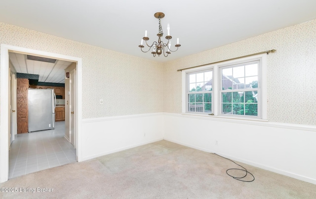 7212 Peppermill Ct, Louisville, KY 40228 - spare room with a chandelier, wallpapered walls, and carpet flooring