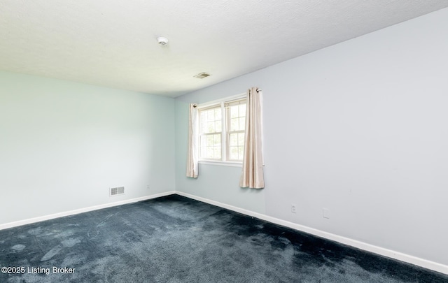 7212 Peppermill Ct, Louisville, KY 40228 - unfurnished room featuring baseboards, dark colored carpet, and a smoke detector