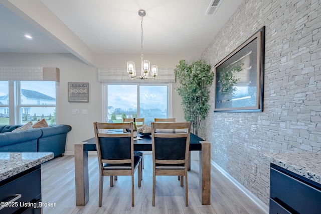 101 Exploration Unit 61A, Shelbyville, KY 40065 - dining room with healthy amount of natural light, a chandelier, light wood-style floors, and baseboards