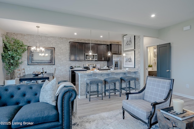 101 Exploration Unit 61A, Shelbyville, KY 40065 - living room with light wood-style flooring, a chandelier, recessed lighting, and baseboards