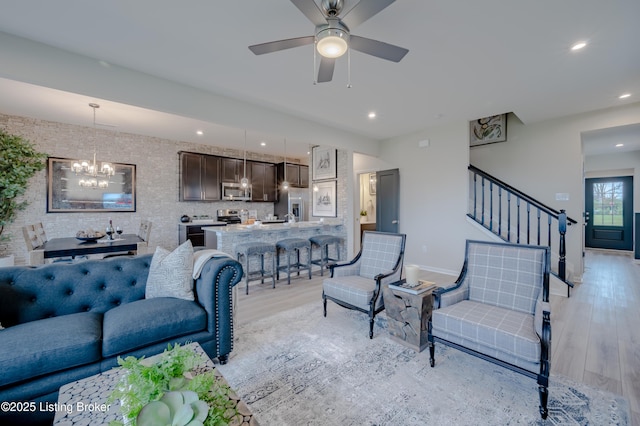 101 Exploration Unit 61A, Shelbyville, KY 40065 - living room featuring a chandelier, light wood-style floors, stairway, a ceiling fan, and recessed lighting