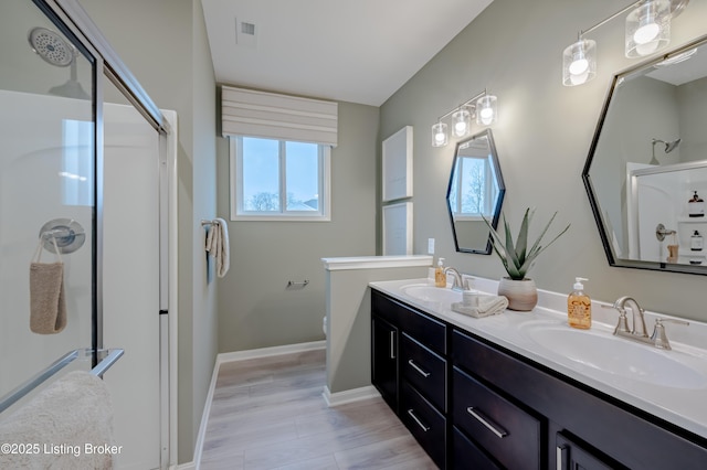 101 Exploration Unit 61A, Shelbyville, KY 40065 - bathroom featuring a shower with door, healthy amount of natural light, double vanity, and toilet