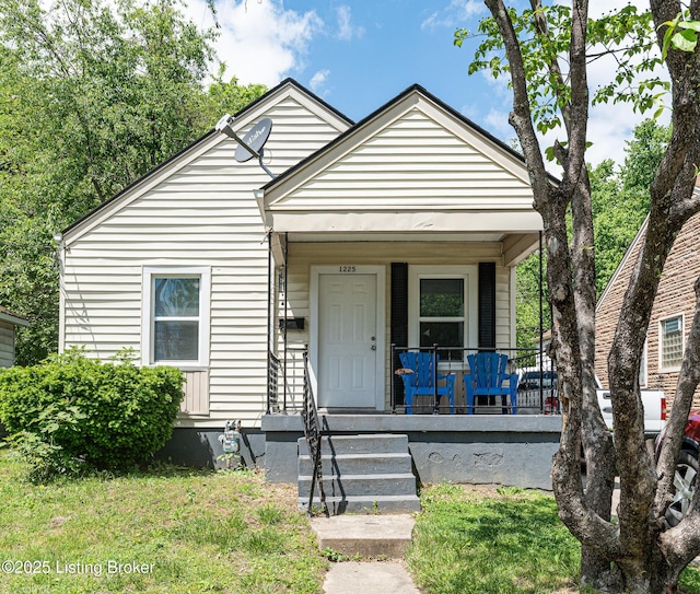 1225 Bicknell Ave, Louisville, KY 40215 - view of front facade with a porch