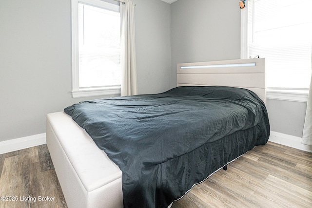 1225 Bicknell Ave, Louisville, KY 40215 - bedroom featuring wood finished floors and baseboards