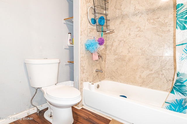 1407 Bluegrass Ave, Louisville, KY 40215 - full bathroom featuring toilet, wood finished floors, and shower / bathtub combination with curtain