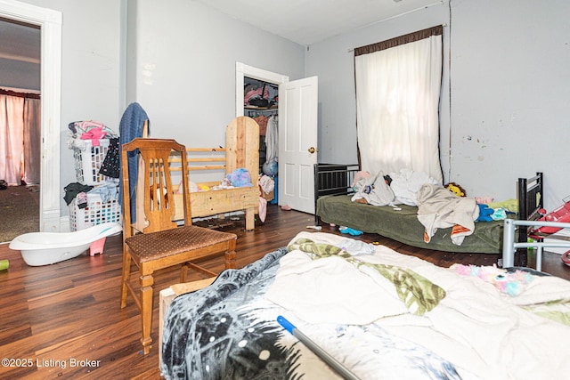 1407 Bluegrass Ave, Louisville, KY 40215 - bedroom featuring wood finished floors and a closet