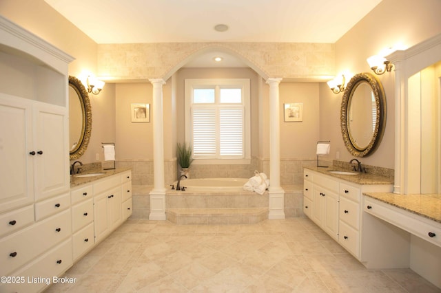 15314 Crystal Springs Way, Louisville, KY 40245 - full bath with decorative columns, a bath, two vanities, and tile patterned floors