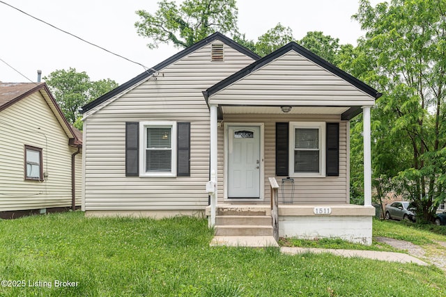 1511 Haskin Ave, Louisville, KY 40215 - view of front of house with a front lawn and a porch