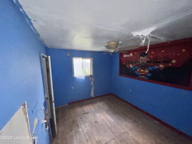 3704 Cliff Ave, Louisville, KY 40215 - empty room featuring wood finished floors, a ceiling fan, and baseboards