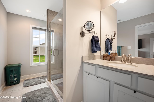18001 Teton Ridge Ct, Louisville, KY 40245 - full bathroom featuring vanity, plenty of natural light, a shower stall, and baseboards