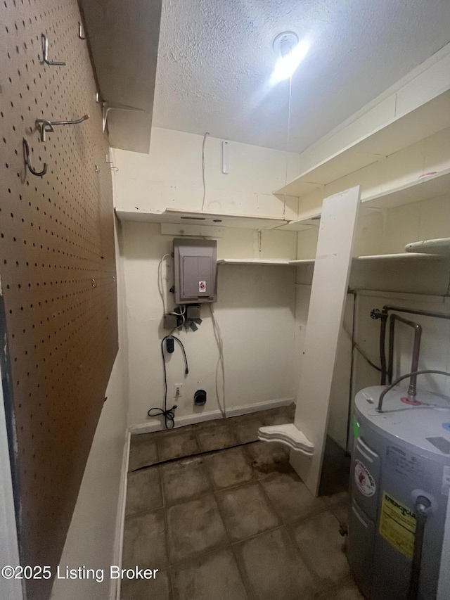 533 Lee Rd, Elizabethtown, KY 42701 - laundry area with water heater, electric panel, and a textured ceiling