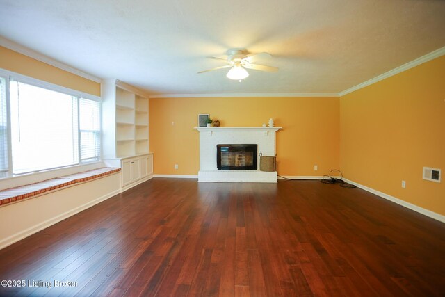 3521 Warner Ave, Louisville, KY 40207 - unfurnished living room featuring a ceiling fan, a fireplace, dark wood-style floors, ornamental molding, and baseboards