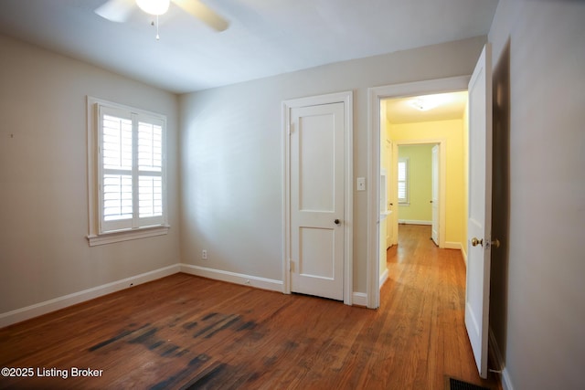 3521 Warner Ave, Louisville, KY 40207 - spare room with a ceiling fan, wood finished floors, and baseboards