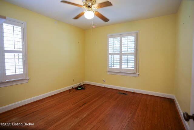 3521 Warner Ave, Louisville, KY 40207 - unfurnished room featuring wood finished floors, baseboards, and ceiling fan