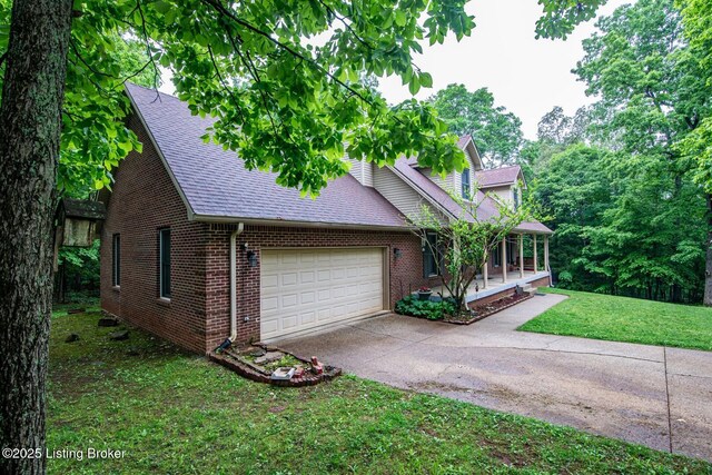 17 Bittersweet Pl, Brandenburg, KY 40108 - view of front of house featuring brick siding, a shingled roof, a garage, and a front yard