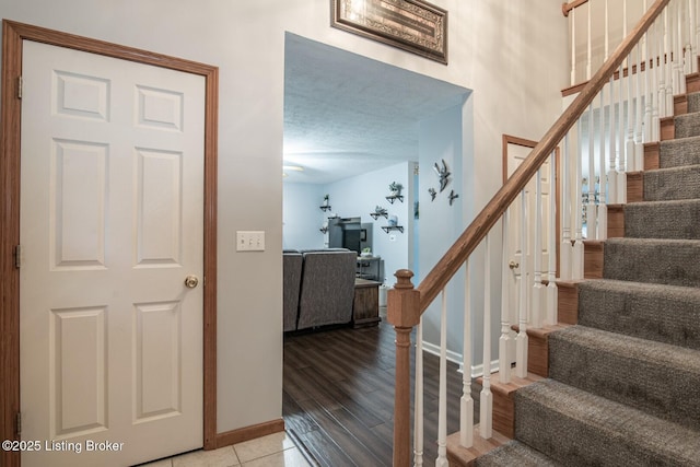 17 Bittersweet Pl, Brandenburg, KY 40108 - stairway featuring baseboards and wood finished floors