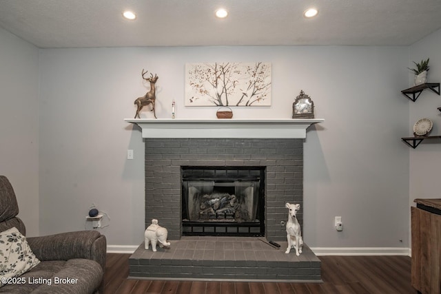 17 Bittersweet Pl, Brandenburg, KY 40108 - living area with wood finished floors, a brick fireplace, baseboards, and recessed lighting