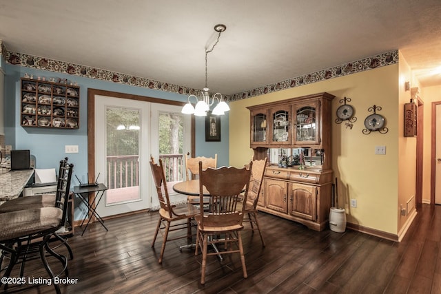 17 Bittersweet Pl, Brandenburg, KY 40108 - dining area with dark wood-type flooring, a chandelier, and baseboards