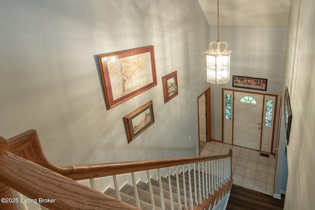 17 Bittersweet Pl, Brandenburg, KY 40108 - entryway with a chandelier, baseboards, and wood finished floors