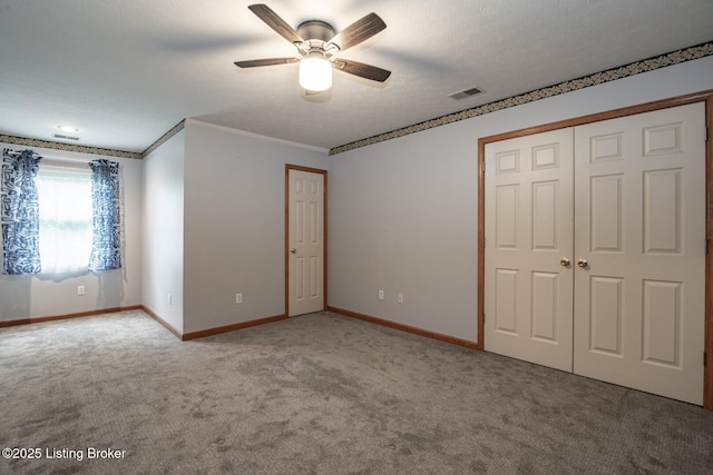 17 Bittersweet Pl, Brandenburg, KY 40108 - unfurnished bedroom featuring carpet, baseboards, ornamental molding, a closet, and ceiling fan