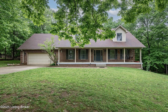 17 Bittersweet Pl, Brandenburg, KY 40108 - view of front of home with a garage, driveway, a porch, and a front lawn