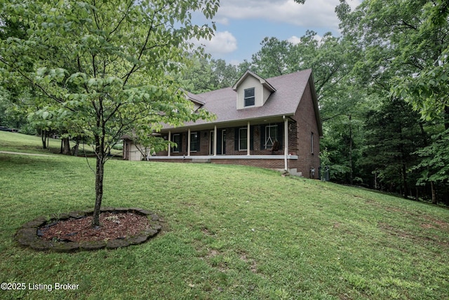 17 Bittersweet Pl, Brandenburg, KY 40108 - cape cod-style house featuring covered porch, brick siding, and a front lawn