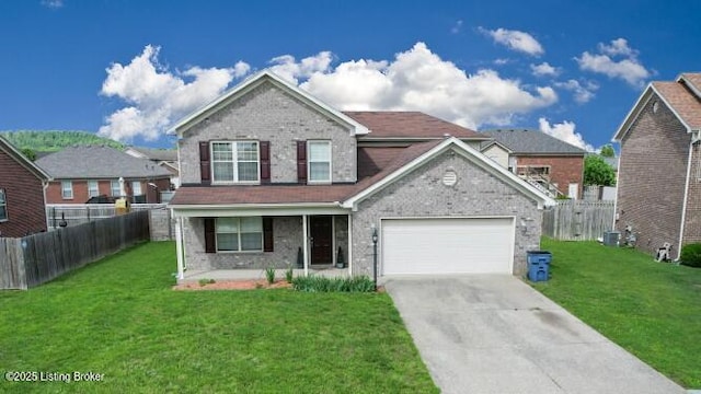 134 Wood Duck Ct, Shepherdsville, KY 40165 - traditional home featuring driveway, covered porch, a garage, and brick siding