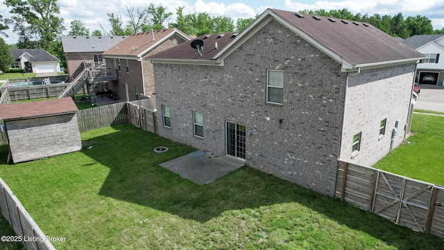 134 Wood Duck Ct, Shepherdsville, KY 40165 - back of property featuring brick siding and a patio
