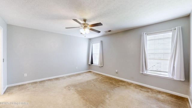 134 Wood Duck Ct, Shepherdsville, KY 40165 - unfurnished room with light carpet, a ceiling fan, baseboards, and a textured ceiling