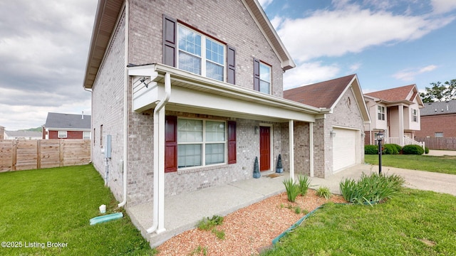 134 Wood Duck Ct, Shepherdsville, KY 40165 - traditional-style house with covered porch, brick siding, and concrete driveway