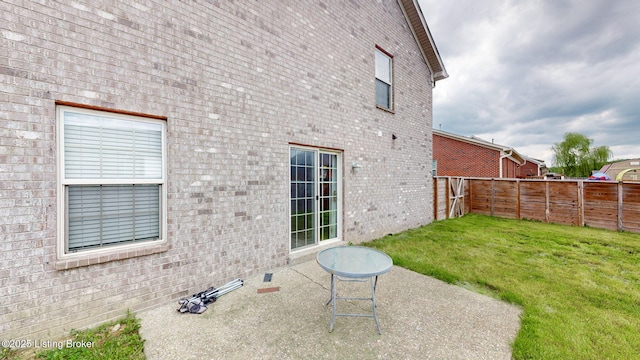 134 Wood Duck Ct, Shepherdsville, KY 40165 - rear view of house featuring brick siding and a patio