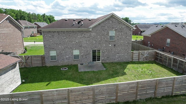 134 Wood Duck Ct, Shepherdsville, KY 40165 - back of house featuring brick siding, a patio area, and a gate